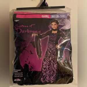 Countess of Darkness child costume. Size M (8-10), black and purple.